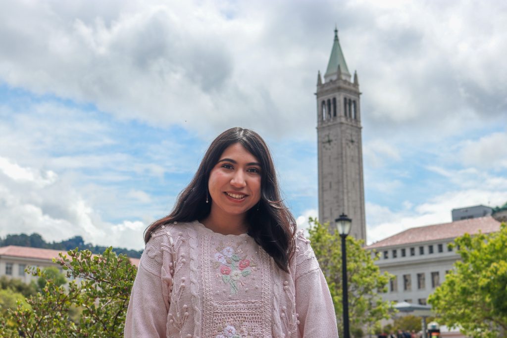 RP Scholar Vanessa Crisostomo Garcia poses for a photo in front of the Campanile on the UC Berkeley campus